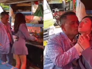 Berita artis: Hotman Paris mencium asisten pribadinya yang saat bergoyang menjual gado-gado, ia pun dicium oleh Hotman Paris.