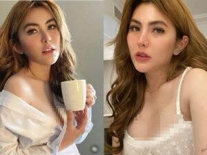 Angela Lee tampil seksi dan menggoda dengan balutan kemeja putih yang memperlihatkan secara jelas belahan dadanya.
