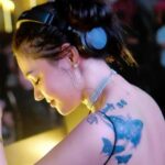 DJ Katty Butterfly hebohkan jagat maya dengan unggahan potretnya yang seksi dengan memperlihatkan beberapa tato di punggung putihnya.