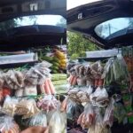 Wanita asal Papua ini menggunakan mobil fortuner untuk menjajakan barang dagangannya berupa sayur mayur keliling kampug.