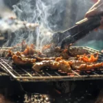 Cekricek.id - Tradisi Bakar-bakar Tahun Baru: Cara Merayakannya dengan Hidangan yang Menggugah Selera