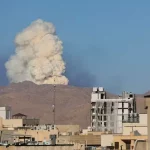 Asap mengepul dari ledakan di wilayah Iran setelah serangan militer Israel