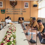 Pertemuan kemitraan strategis antara DPMPTSP Sumbar dan HIPMI Sumbar untuk meningkatkan investasi daerah di Kantor DPMPTSP Sumbar