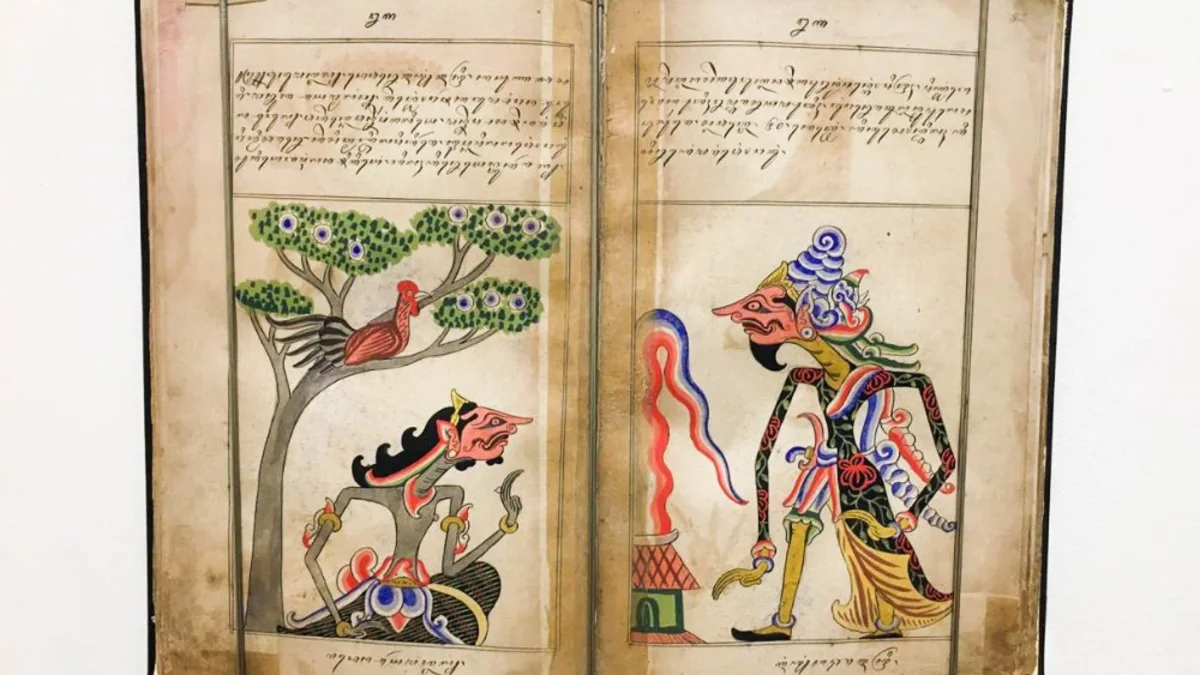 Halaman naskah Jawa dengan gambar tokoh wayang berwarna di kedua sisinya