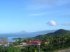 Pemandangan Kota Sofifi di pesisir Halmahera dengan laut dan pulau di kejauhan