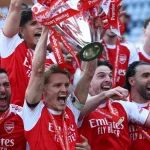 Para pemain Arsenal merayakan gelar juara Liga Primer Inggris. [Foto: Reuters]