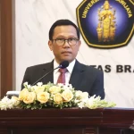 Deputi Bidang Pembangunan Manusia dan Kebudayaan Kementerian PPN/Bappenas Bahjuri Ali berbicara di podium ORDIK Pascasarjana Universitas Brawijaya.