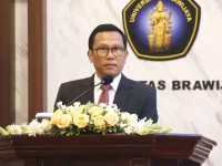 Deputi Bidang Pembangunan Manusia dan Kebudayaan Kementerian PPN/Bappenas Bahjuri Ali berbicara di podium ORDIK Pascasarjana Universitas Brawijaya.