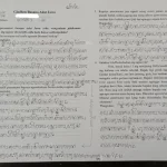 Halaman tulisan beraksara Jawa.
