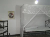 Kamar tidur di rumah pengasingan Mohammad Hatta di Banda Neira.