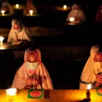 Tadarus malam selikuran di sebuah surau.