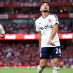 Martin Baturina merayakan gol saat Como melawan Arsenal dalam laga pramusim