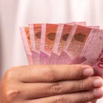 Ilustrasi uang tunai rupiah terkait penyetoran uang rampasan kasus TPPU judi online
