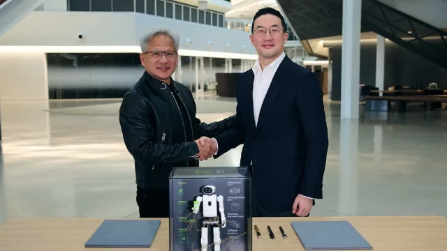 Jensen Huang dan Kwang Mo Koo berjabat tangan di markas Nvidia, Santa Clara