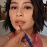 Prilly Latuconsina saat proses tata rias di lokasi pemotretan ily.gold