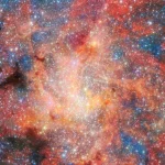 Citra medan IRS 3 hasil gabungan instrumen NIRCam dan MIRI James Webb Space Telescope di sekitar lubang hitam Sagitarius A*.
