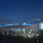 Foto arsip Amex Stadium markas Brighton pada malam hari