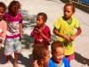 Anak-anak Papua bernyanyi bersama di kepulauan Raja Ampat, Papua Barat Daya