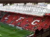 Tribune The Kop dan lapangan Stadion Anfield
