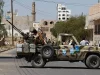 Foto arsip anggota kelompok Houthi di atas truk militer di Sanaa pada Oktober 2014
