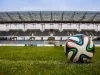 Bola di tengah lapangan stadion sepak bola