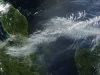 Citra satelit gumpalan asap kebakaran hutan di atas laut dan daratan