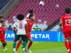 Pemain Singapura dan Bangladesh berebut bola udara di FIFA ASEAN Cup