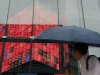 Papan indeks Nikkei di Bursa Tokyo saat Bank Jepang umumkan kenaikan suku bunga