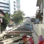 Buruh konstruksi perempuan di proyek pembangunan, Bangkok, Thailand