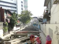 Buruh konstruksi perempuan di proyek pembangunan, Bangkok, Thailand