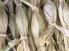Dodol Gorontalo terbungkus daun nipah muda yang diikat pada bagian ujungnya
