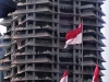 Bendera Merah Putih berkibar di depan gedung bertingkat di Jakarta