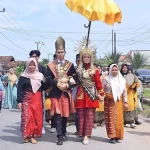Ilustrasi arak-arakan pengantin pada tayuhan, perhelatan adat masyarakat Lampung Pesisir