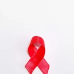 Ilustrasi pita merah sebagai lambang kepedulian terhadap HIV dan AIDS
