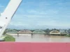 Jembatan berpelengkung di Sarolangun membentang di atas air sungai yang keruh kecokelatan