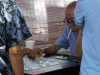 Lansia bermain xiangqi di ruang publik Singapura