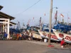 Perahu nelayan bercat warna-warni bersandar di Tempat Pelelangan Ikan Eretan Wetan, Kandanghaur, Indramayu