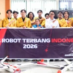 Tim robotik Universitas Jenderal Soedirman bersama wahana untuk KRTI 2026