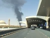 Asap hitam membubung dari area penyimpanan bahan bakar Bandara King Khalid, Riyadh