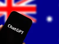 Ponsel menampilkan logo ChatGPT dengan latar bendera Australia