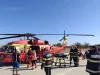 Petugas pemadam dan penyelamat di dekat helikopter di Constanta, Rumania