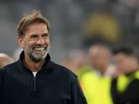 Juergen Klopp tersenyum jelang laga Jerman melawan Serbia di Muenchen