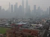 Gedung-gedung pencakar langit Kuala Lumpur diselimuti kabut asap