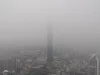 Kabut asap tebal menyelimuti gedung-gedung tinggi di Kuala Lumpur, Malaysia