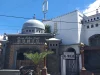 Ilustrasi gerbang dan kubah Masjid Hunto Sultan Amai berdinding putih di Kelurahan Biawu, Kota Gorontalo