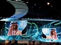 Layar panggung konferensi FII di Riyadh menampilkan Menlu Saudi Pangeran Faisal bin Farhan