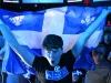 Pendukung Parti Quebecois membentangkan bendera Quebec di Montreal, Kanada