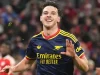 Declan Rice merayakan gol penyama kedudukan Arsenal di markas Bayern Muenchen