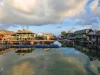 Ilustrasi rumah-rumah panggung suku Bajo di atas laut tenang, Desa Bajo Sampela, Wakatobi, Sulawesi Tenggara