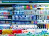 Rak pendingin berisi produk susu dan minuman di sebuah supermarket di Jawa Barat